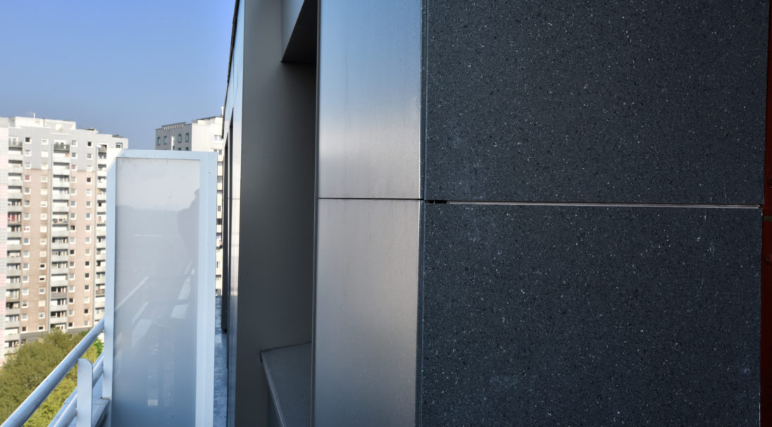 Mourinoux tower rainscreen cladding with subframe